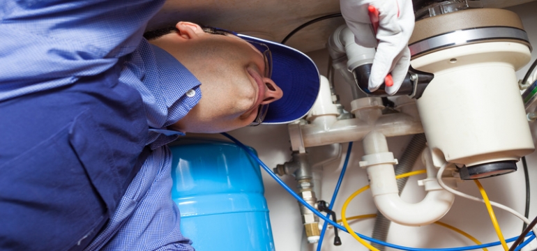 Plumber at work